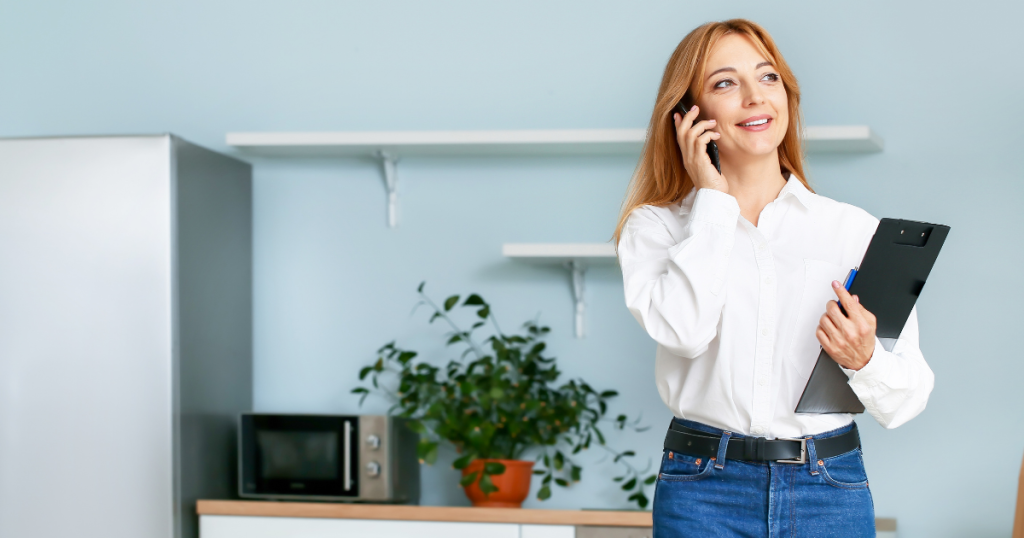 Businesswoman discussing unsecured loans on the phone in a modern office setting, emphasizing safe lending practices.