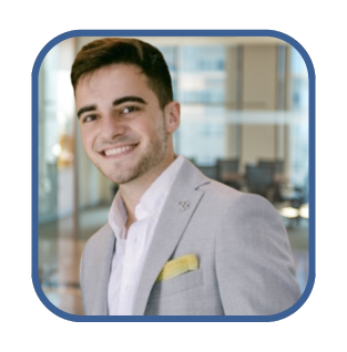 Professional smiling young man in a suit, representing customer-centric financing solutions for business growth.