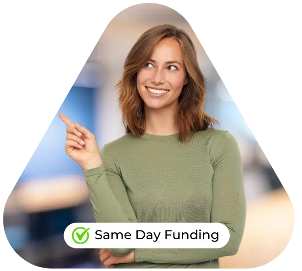 Smiling woman promoting same day funding for fast and flexible business loan solutions.