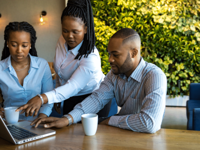 Business team collaborating on credit diversification strategies for growth and financial stability in a modern workspace.