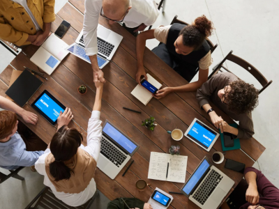 Business professionals discussing fast approval unsecured credit lines for small businesses in a modern office setting.