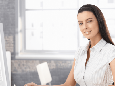 Businesswoman at desk exploring fast business loans from alternative lenders for funding solutions.