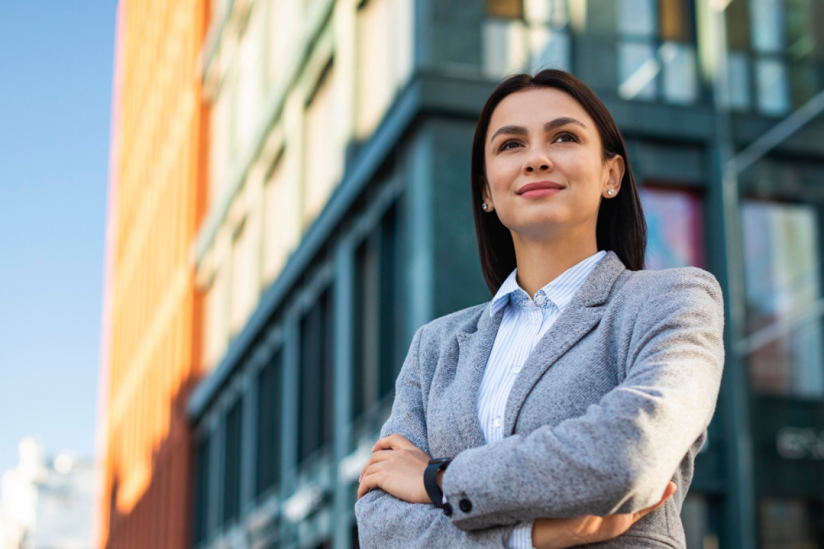 Business professional looking confidently towards the future, representing effective strategies for finding seasonal workers.