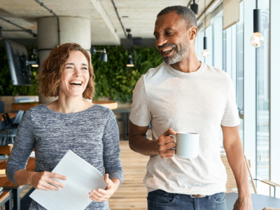 Business professionals discussing commercial loans and financing solutions in a modern office setting.