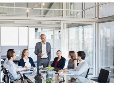 Business meeting focused on positive company culture and employee engagement strategies.