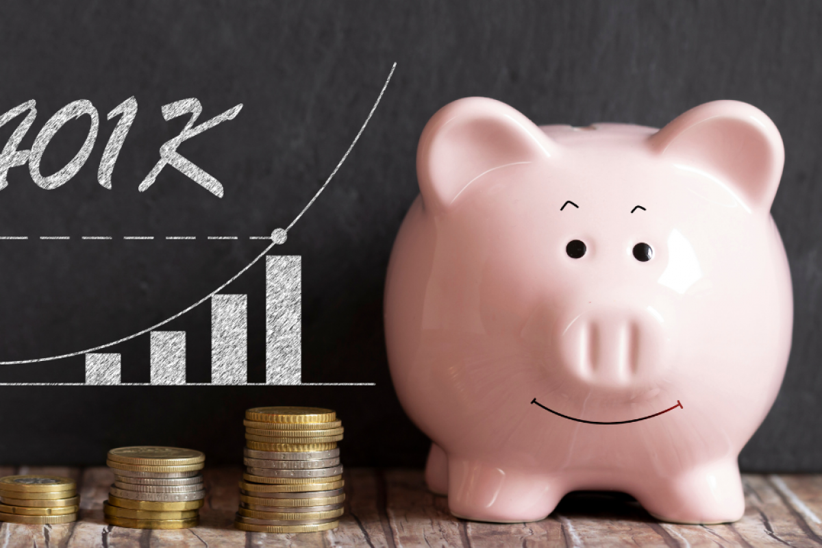 Piggy bank with 401K growth chart and coins, symbolizing business financing options over retirement savings.